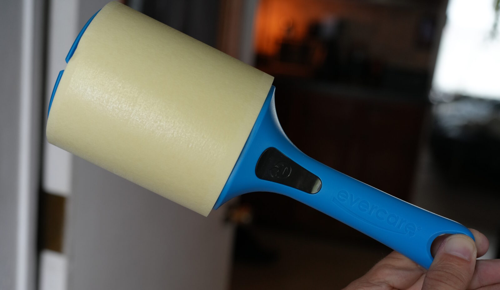 Evercare lint roller with sticky peel-off sheets, blue handle